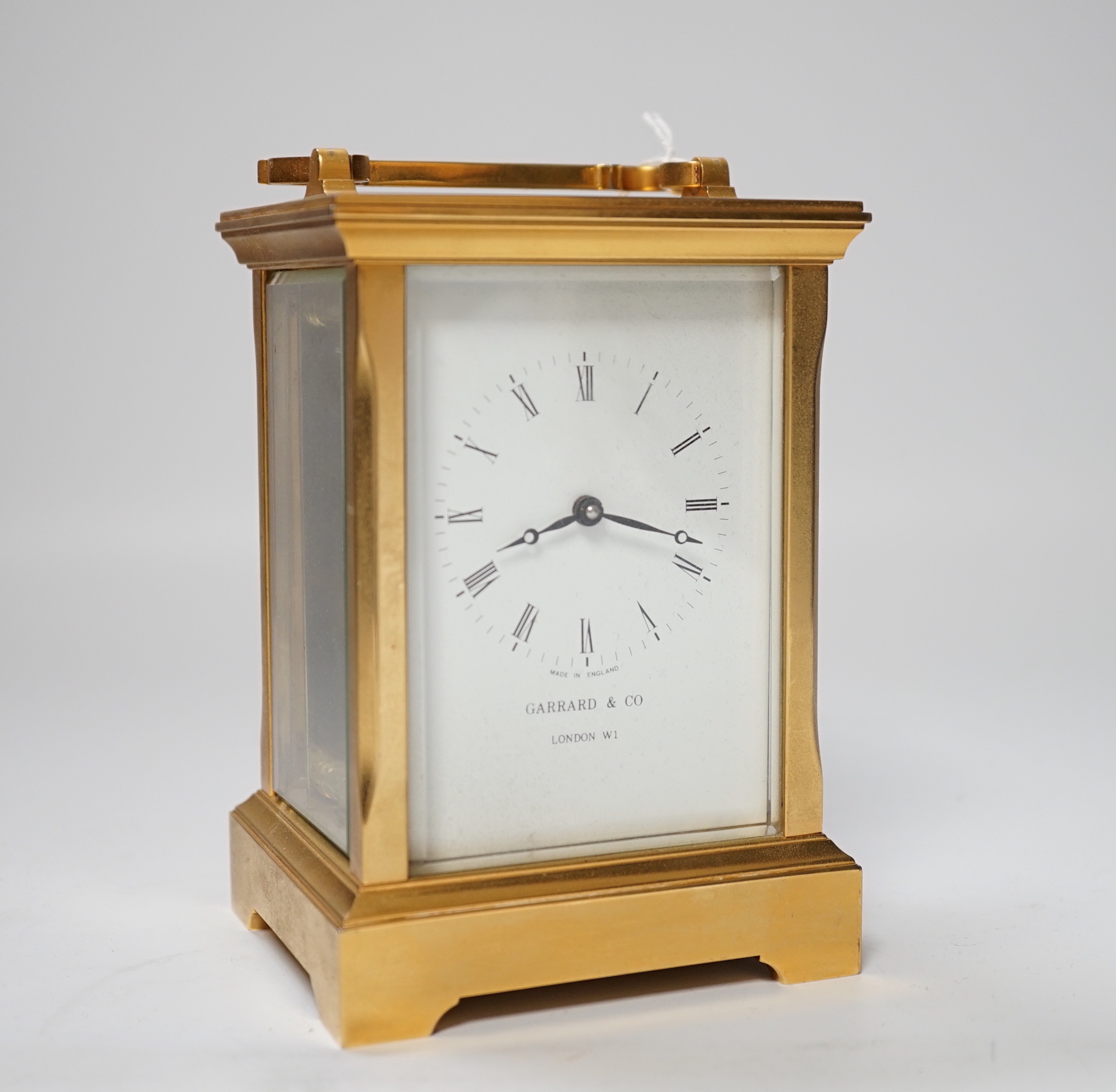 A carriage timepiece, signed Garrard and Co. to the face and stamped ‘Made in England’, 13.5cm